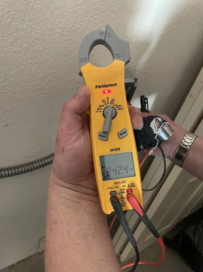 Voltage testing with clamp meter during Hot Tub / Pool Electrical Wiring in Dearborn Heights